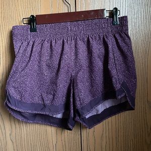 Athleta mesh racer run shorts.